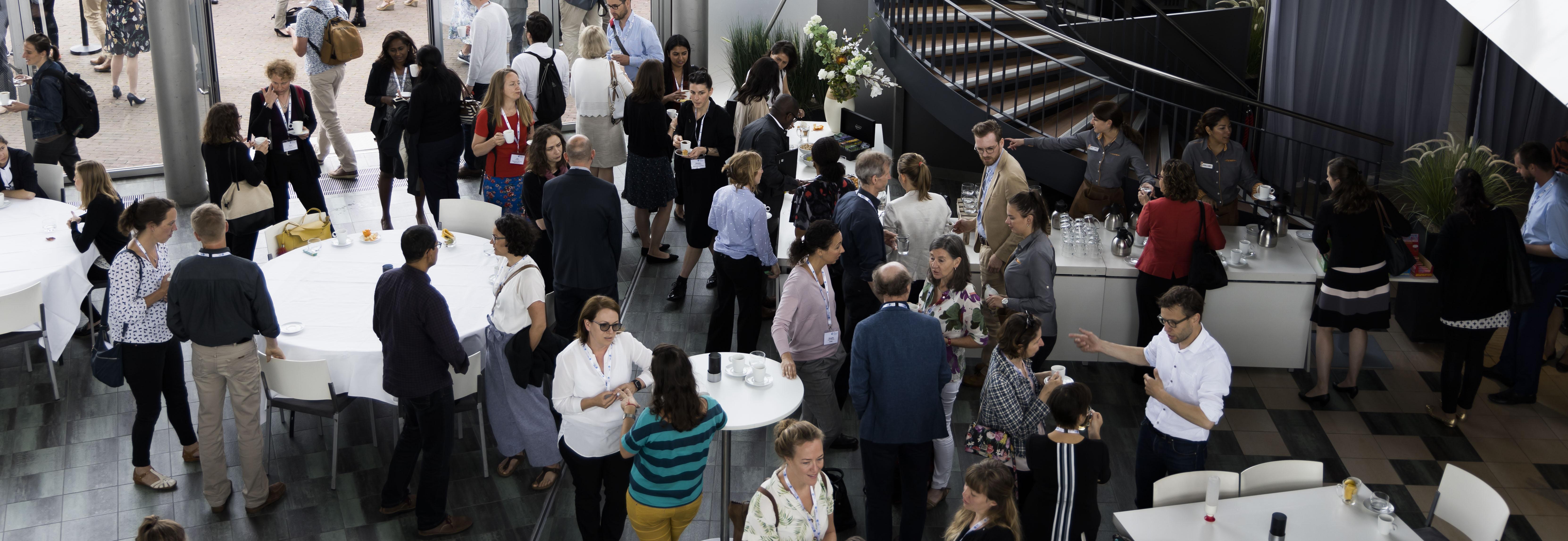 delegates networking at ISEAL's 2019 Symposium
