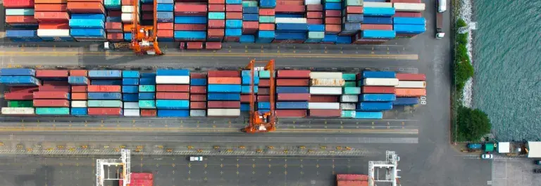 Aerial view of shipping containers at a shipping port © Pexels