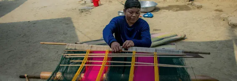 Woman traditional handloom weaving in Bangladesh