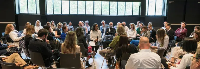 Group of people engaging in a session at the ISEAL Global Sustainability Symposium