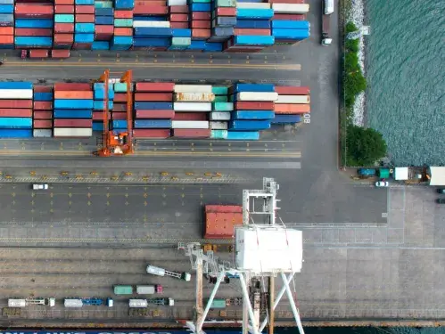 Aerial view of shipping containers at a shipping port © Pexels