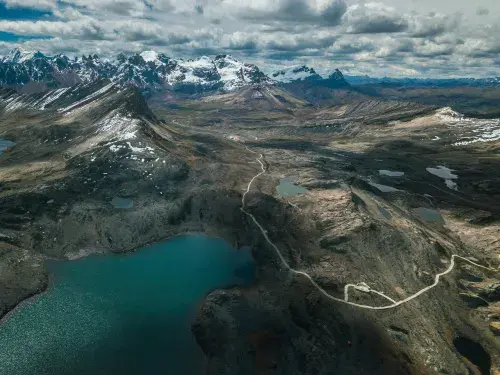 Landscape of mountains and a lake &copy; Pexels