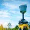 GPS surveying instrument on blue sky and rice field background © Artinun, Adobe stock
