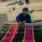 Woman traditional handloom weaving in Bangladesh